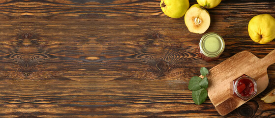 Composition with sweet quince jam on wooden background with space for text