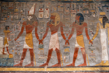colorful hieroglyphs in ancient egyptian tomb in the valley of the kings in luxor, egypt