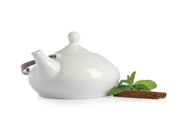Teapot of fresh mint tea with cinnamon isolated on white background