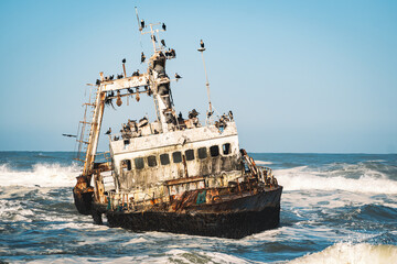 Zeila Shipwreck located near Henties Bay, Skeleton Coast, Namibia. The Zeila was an offshore fishing vessel that ran aground in 2008. - obrazy, fototapety, plakaty
