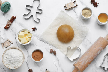 Composition with ingredients and utensils for preparing Christmas cookies on light background