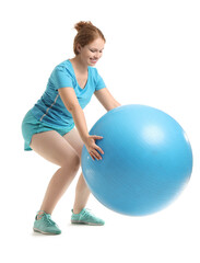 Beautiful young woman in sportswear exercising with fitness ball on white background