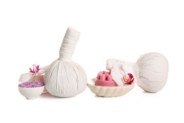 Composition with spa herbal bags, cosmetic products and orchid flowers isolated on white background