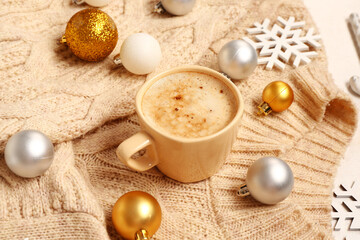 Fototapeta na wymiar Beautiful composition with cup of coffee and Christmas balls on table
