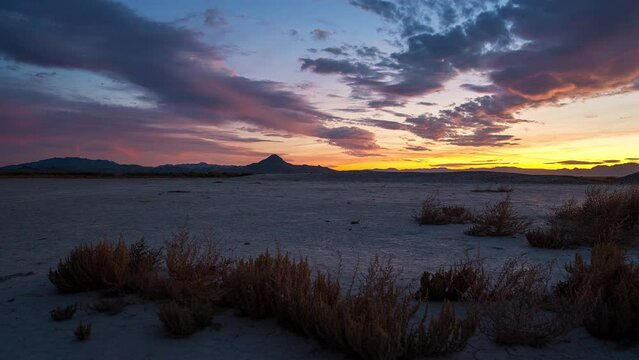 Timelapse of colorful sunset over the dry desert in Utah near Simpson Springs.