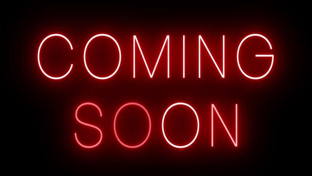 Flickering red retro style neon sign glowing against a black background