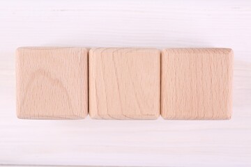 International Organization for Standardization. Cubes with abbreviation ISO on white wooden table,...