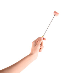 Woman holding fork with piece of raw meat on white background