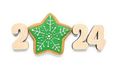 Tasty Christmas cookie in shape of star and figure 2024 on white background