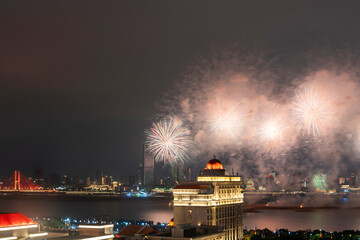 Colorful fireworks exploding at english bay against sky