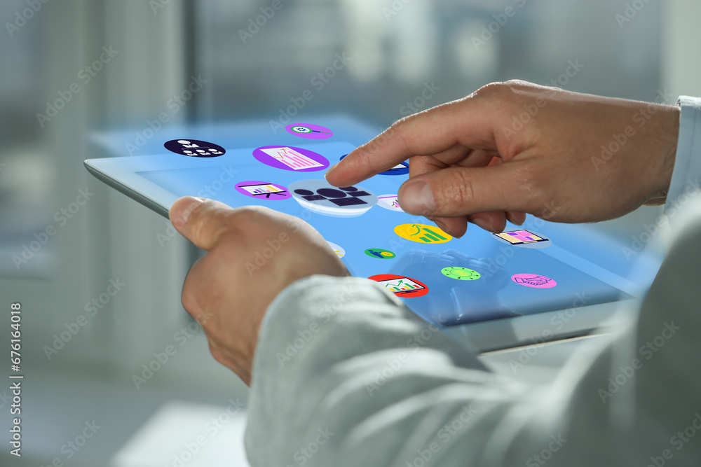 Poster marketing strategy. man using tablet computer with virtual screen and icons indoors, closeup