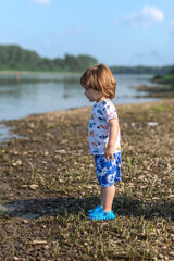 little boy outdoors in summer