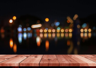 perspective wooden board over blurred bokeh at night