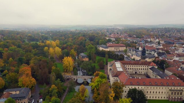 Marvelous aerial top view flight 
Weimar Historic bridge over Ilm river  Thuringia Germany fall 23. overflight flyover drone
4k footage