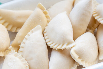 Several frozen semi-finished dumplings, tasty food