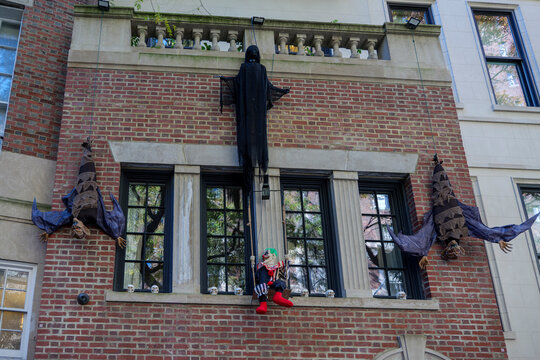 Halloween creepy decorations on front of the building in New York City. High quality photo
