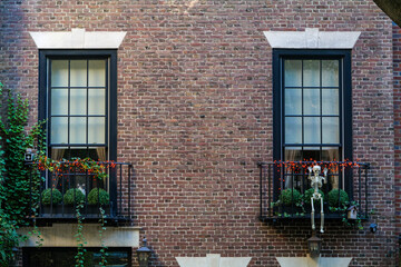 Fototapeta na wymiar Halloween creepy decorations on front of the building in New York City. High quality photo