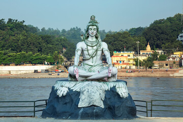 statue of Hindu deity God Shiva along river Ganges in Rishikesh, Uttarakhand,India.