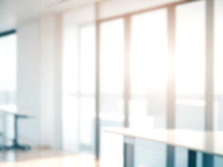 Blurred image of mordern office with sunlight for background usage. Blur interior background concept.