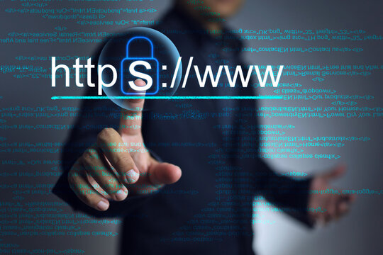 The programmer hand pointing on https www to choosing a domain type  more secure adding S to increase security encrypted communication protocol using Asymmetric Algorithm