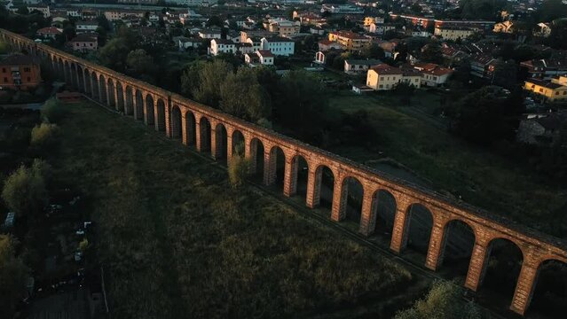 Drone footage of the Aqueduct of Nottolini, Lucca, in the region of Tuscany, Italy during sunrise in 4K