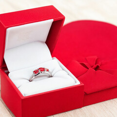 valentines ring in a red gift box background