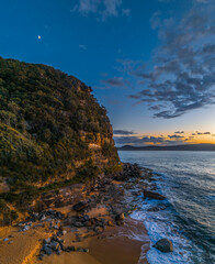 Aerial sunrise views over the ocean and beach