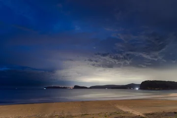 Foto auf Alu-Dibond Evening storm clouds over the sea © Merrillie