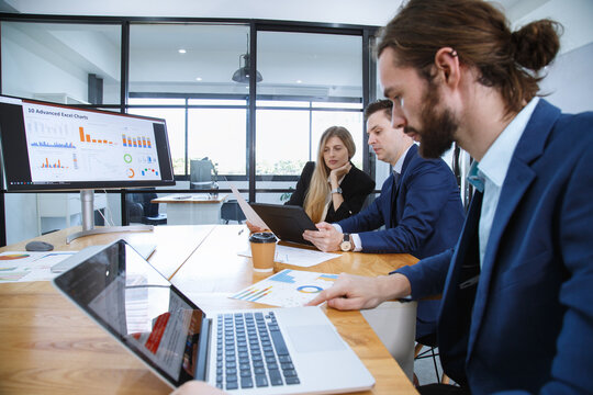 young investor businessmen and business woman team meeting to analysis risk and profit opportunity investment in international stock market. Business finance and banking concept.