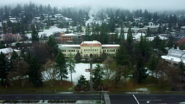 Ashland, Oregon, USA, Winter 2023.  Southern Oregon University. Orbiting Churchill Hall, the original 1926 college building and current administration building.