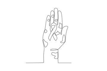 Obraz premium A hand holding a leprosy symbol ribbon. World Leprosy Day one-line drawing