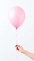 hand holding a pink balloon, white background