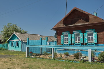 Fototapeta na wymiar Decor of village houses in the village of Posolskoye on Lake Baikal.