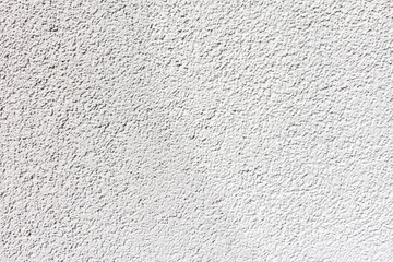 White plaster on the wall of a house as an abstract background