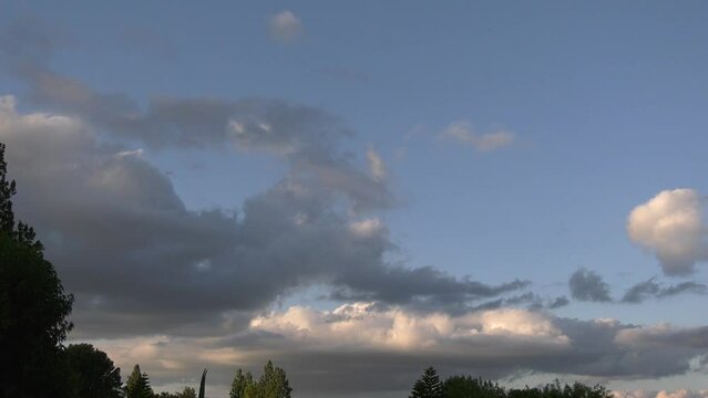 Clouds form during orange sunset