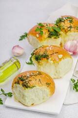 Aromatic garlic buns. Fresh baked goods, a traditional gluten-free soup snack. Parsley, spices