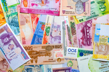 Country multi-currency banknotes and currency exchange concept