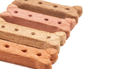 A Row of Four Dog Treat Isolated on a White Background