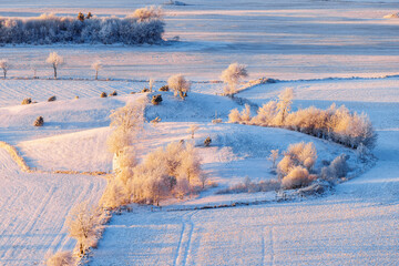 Winter countryside landscape with snow and frost