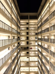 Apartment high-rise building interior at night time