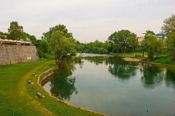 Fototapeta na wymiar The Vrbas River as it flows through Banja Luka in Republika Srpska, Bosnia and Herzegovina. Viewed from Kastel Fortress castle