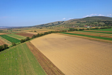 Flying above textured, plowed agriculture fields by drone