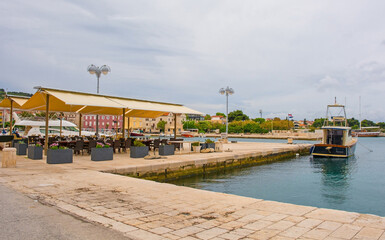Fototapeta na wymiar A waterfront restaurant in Supetar on Brac Island, Croatia