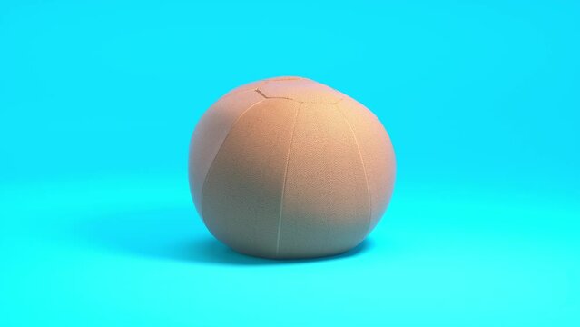 Sports 3D Animation: photo realistic medicine ball rotates against a clean blue backdrop. Perfect for sport, fitness, and functional training concepts. High quality render.