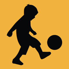 shilouette of child playing football