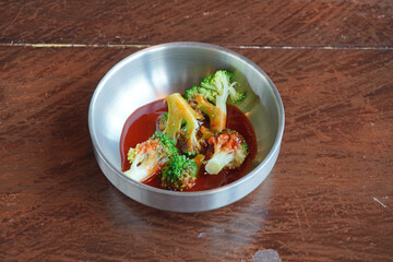 Banchan or Korean food side dishes. Traditional Korean banchan consisting of Kimchi, salted and fermented vegetables, most commonly using napa cabbage or Korean radish and vegetables. Selective focus