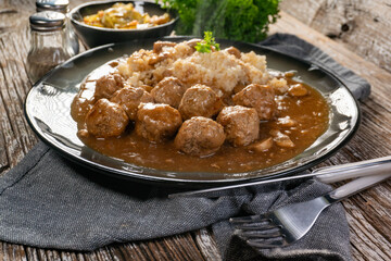 Minced meat balls in mushroom sauce.
