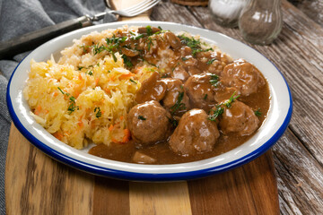 Minced meat balls in mushroom sauce.