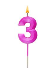 Pink birthday candle isolated on white background, number 3.