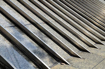 Closeup of Marble Tiles with Stainless Steel Sheet pattern floor background for design and decoration at Thailand.